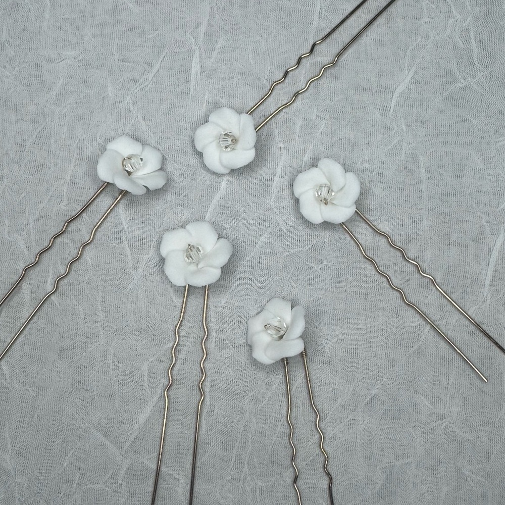 White flower hair pins with clear rhinestone center and gold hardware